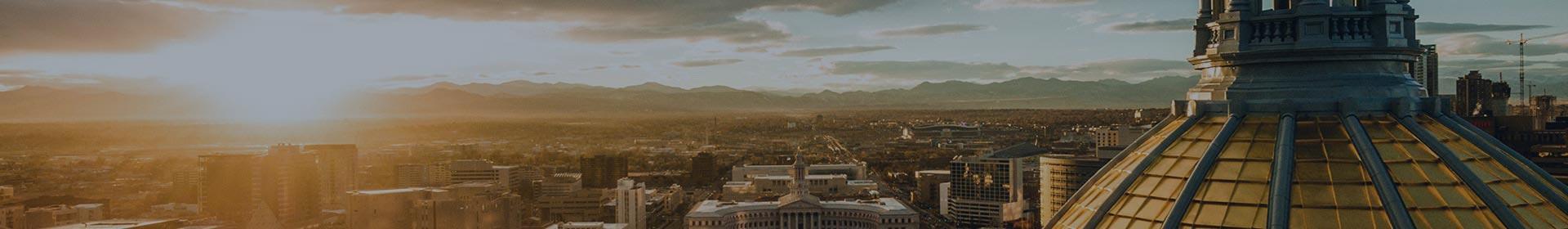 Colorado state capitol dome with sunset